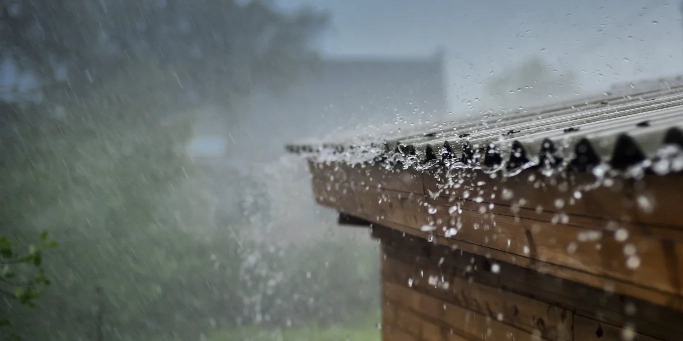 rain flows down from a roof down rain flows down from a roof down
